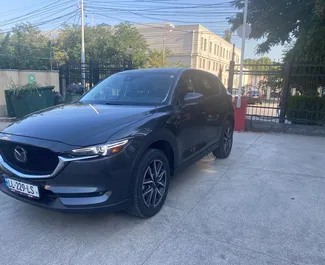 Vooraanzicht van een huurauto Mazda CX-5 in Tbilisi, Georgië ✓ Auto #10127. ✓ Transmissie Automatisch TM ✓ 0 beoordelingen.