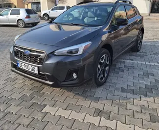 Vooraanzicht van een huurauto Subaru Crosstrek in Tbilisi, Georgië ✓ Auto #10131. ✓ Transmissie Automatisch TM ✓ 0 beoordelingen.