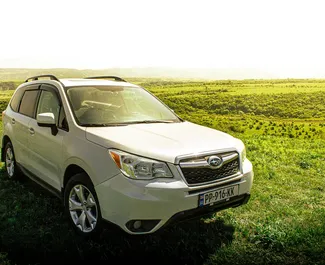 Vooraanzicht van een huurauto Subaru Forester in Tbilisi, Georgië ✓ Auto #10142. ✓ Transmissie Automatisch TM ✓ 0 beoordelingen.