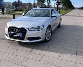 Vooraanzicht van een huurauto Audi A6 in Tirana, Albanië ✓ Auto #9910. ✓ Transmissie Automatisch TM ✓ 0 beoordelingen.