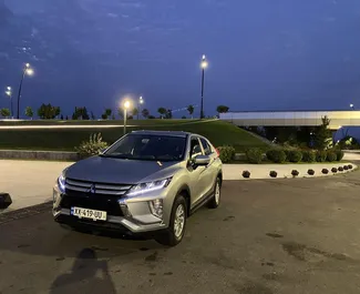 Vooraanzicht van een huurauto Mitsubishi Eclipse Cross in Tbilisi, Georgië ✓ Auto #10128. ✓ Transmissie Automatisch TM ✓ 0 beoordelingen.