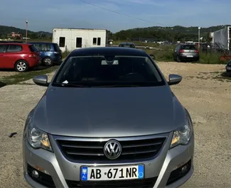 Vooraanzicht van een huurauto Volkswagen Passat-CC op de luchthaven van Tirana, Albanië ✓ Auto #10308. ✓ Transmissie Automatisch TM ✓ 0 beoordelingen.