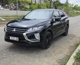 Vooraanzicht van een huurauto Mitsubishi Eclipse Cross in Tbilisi, Georgië ✓ Auto #10296. ✓ Transmissie Automatisch TM ✓ 0 beoordelingen.