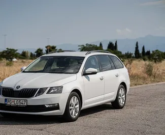 Vooraanzicht van een huurauto Skoda Octavia Combi in Podgorica, Montenegro ✓ Auto #6701. ✓ Transmissie Automatisch TM ✓ 2 beoordelingen.