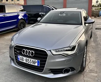 Vooraanzicht van een huurauto Audi A6 op de luchthaven van Tirana, Albanië ✓ Auto #10446. ✓ Transmissie Automatisch TM ✓ 0 beoordelingen.