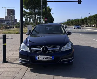 Vooraanzicht van een huurauto Mercedes-Benz C-Class in Tirana, Albanië ✓ Auto #10549. ✓ Transmissie Automatisch TM ✓ 0 beoordelingen.