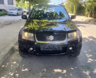 Vooraanzicht van een huurauto Suzuki Grand Vitara in Durrës, Albanië ✓ Auto #10584. ✓ Transmissie Automatisch TM ✓ 0 beoordelingen.