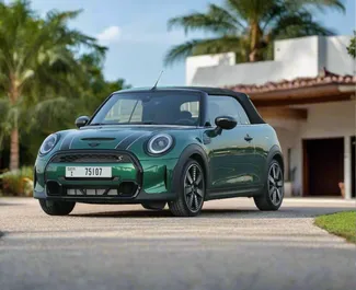 Vooraanzicht van een huurauto Mini Cooper S Cabrio in Dubai, Verenigde Arabische Emiraten ✓ Auto #10538. ✓ Transmissie Automatisch TM ✓ 0 beoordelingen.