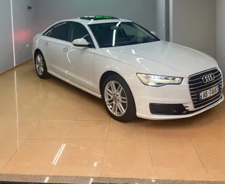 Vooraanzicht van een huurauto Audi A6 op de luchthaven van Tirana, Albanië ✓ Auto #10632. ✓ Transmissie Automatisch TM ✓ 0 beoordelingen.