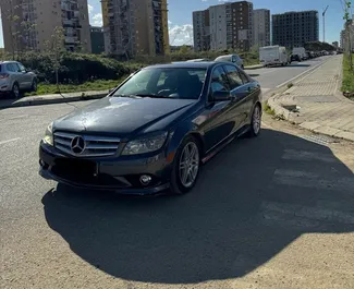 Vooraanzicht van een huurauto Mercedes-Benz C-Class in Tirana, Albanië ✓ Auto #10560. ✓ Transmissie Automatisch TM ✓ 0 beoordelingen.