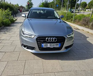 Vooraanzicht van een huurauto Audi A6 in Tirana, Albanië ✓ Auto #10785. ✓ Transmissie Automatisch TM ✓ 0 beoordelingen.