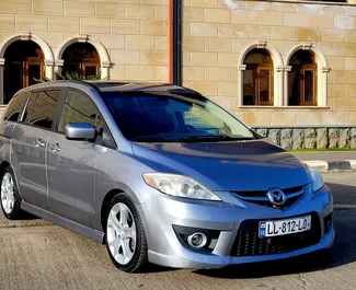 Vooraanzicht van een huurauto Mazda 5 in Koetaisi, Georgië ✓ Auto #8675. ✓ Transmissie Automatisch TM ✓ 1 beoordelingen.