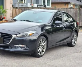 Vooraanzicht van een huurauto Mazda 3 in Batumi, Georgië ✓ Auto #10759. ✓ Transmissie Automatisch TM ✓ 0 beoordelingen.