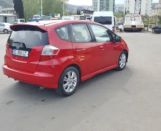 Verhuur Honda Fit. Economy, Comfort Auto te huur in Georgië ✓ Borg van Borg van 200 GEL ✓ Verzekeringsmogelijkheden TPL, CDW, SCDW, Passagiers, Diefstal, Jonge.