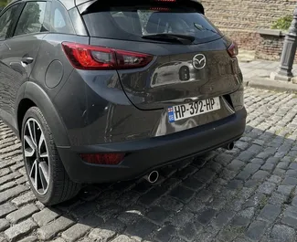 Mazda CX-3 2018 beschikbaar voor verhuur in Tbilisi, met een kilometerlimiet van onbeperkt.