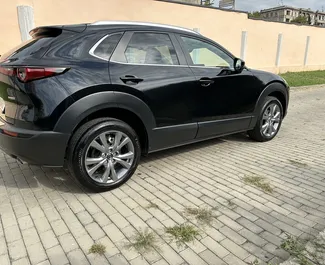 Verhuur Mazda CX-30. Economy, Comfort, Crossover Auto te huur in Georgië ✓ Borg van Zonder Borg ✓ Verzekeringsmogelijkheden TPL, FDW, Passagiers, Diefstal.