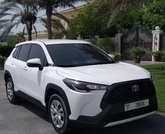 Vooraanzicht van een huurauto Toyota Corolla Cross in Dubai, Verenigde Arabische Emiraten ✓ Auto #10031. ✓ Transmissie Automatisch TM ✓ 0 beoordelingen.