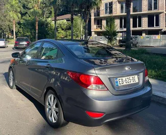 Hyundai Accent 2014 beschikbaar voor verhuur in Koetaisi, met een kilometerlimiet van onbeperkt.