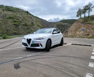 Vooraanzicht van een huurauto Alfa Romeo Stelvio Quadrifoglio in Tbilisi, Georgië ✓ Auto #11483. ✓ Transmissie Automatisch TM ✓ 0 beoordelingen.