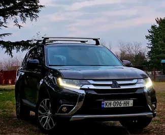 Vooraanzicht van een huurauto Mitsubishi Outlander Xl in Koetaisi, Georgië ✓ Auto #11168. ✓ Transmissie Automatisch TM ✓ 0 beoordelingen.