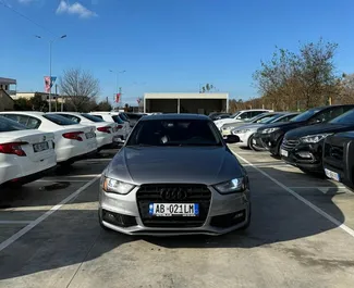 Vooraanzicht van een huurauto Audi A4 op de luchthaven van Tirana, Albanië ✓ Auto #11585. ✓ Transmissie Automatisch TM ✓ 0 beoordelingen.