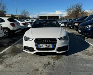 Vooraanzicht van een huurauto Audi A5 Cabrio op de luchthaven van Tirana, Albanië ✓ Auto #11586. ✓ Transmissie Handmatig TM ✓ 0 beoordelingen.