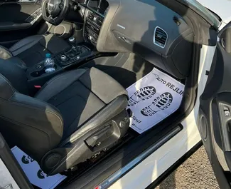 Audi A5 Cabrio 2016 beschikbaar voor verhuur op de luchthaven van Tirana, met een kilometerlimiet van onbeperkt.