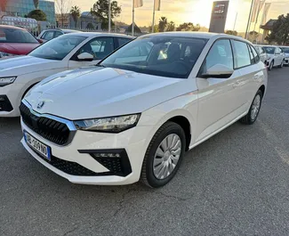 Vooraanzicht van een huurauto Skoda Scala op de luchthaven van Tirana, Albanië ✓ Auto #11521. ✓ Transmissie Handmatig TM ✓ 0 beoordelingen.