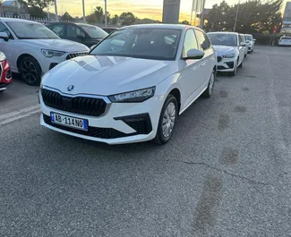 Vooraanzicht van een huurauto Skoda Scala op de luchthaven van Tirana, Albanië ✓ Auto #11520. ✓ Transmissie Handmatig TM ✓ 0 beoordelingen.