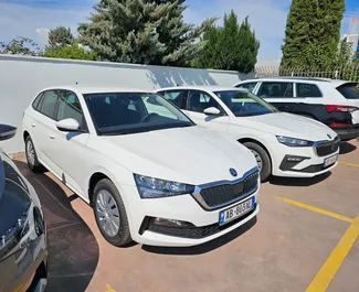 Vooraanzicht van een huurauto Skoda Scala op de luchthaven van Tirana, Albanië ✓ Auto #11515. ✓ Transmissie Automatisch TM ✓ 0 beoordelingen.