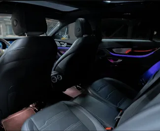 Mercedes-Benz AMG GT63 2022 beschikbaar voor verhuur op de internationale luchthaven van Dubai, met een kilometerlimiet van 200 km/dag.