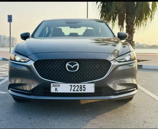 Vooraanzicht van een huurauto Mazda 6 op de internationale luchthaven van Dubai, Verenigde Arabische Emiraten ✓ Auto #11543. ✓ Transmissie Automatisch TM ✓ 0 beoordelingen.