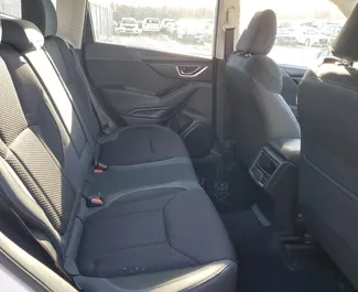 Interieur van Subaru Forester te huur in Georgië. Een geweldige auto met 5 zitplaatsen en een Automatisch transmissie.