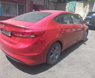 Vooraanzicht van een huurauto Hyundai Elantra op de luchthaven van Tbilisi, Georgië ✓ Auto #11832. ✓ Transmissie Automatisch TM ✓ 0 beoordelingen.