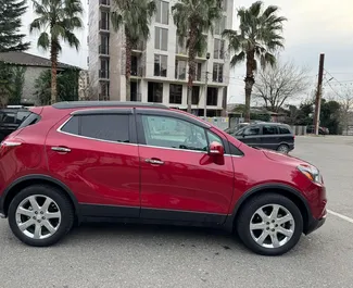 Interieur van Buick Encore te huur in Georgië. Een geweldige auto met 5 zitplaatsen en een Automatisch transmissie.