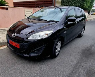 Vooraanzicht van een huurauto Mazda Premacy in Limassol, Cyprus ✓ Auto #6681. ✓ Transmissie Automatisch TM ✓ 0 beoordelingen.