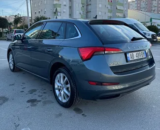 Vooraanzicht van een huurauto Skoda Scala op de luchthaven van Tirana, Albanië ✓ Auto #11495. ✓ Transmissie Automatisch TM ✓ 0 beoordelingen.