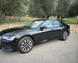 Vooraanzicht van een huurauto Audi A6 in Becici, Montenegro ✓ Auto #12159. ✓ Transmissie Automatisch TM ✓ 0 beoordelingen.