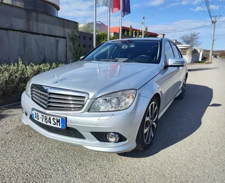 Vooraanzicht van een huurauto Mercedes-Benz C220 d in Tirana, Albanië ✓ Auto #11868. ✓ Transmissie Automatisch TM ✓ 0 beoordelingen.