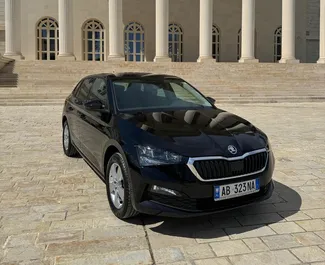 Vooraanzicht van een huurauto Skoda Scala op de luchthaven van Tirana, Albanië ✓ Auto #11605. ✓ Transmissie Automatisch TM ✓ 0 beoordelingen.