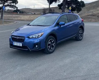 Vooraanzicht van een huurauto Subaru Crosstrek in Tbilisi, Georgië ✓ Auto #12220. ✓ Transmissie Automatisch TM ✓ 0 beoordelingen.