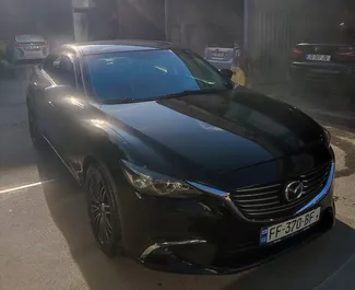 Vooraanzicht van een huurauto Mazda 6 in Tbilisi, Georgië ✓ Auto #12498. ✓ Transmissie Automatisch TM ✓ 0 beoordelingen.