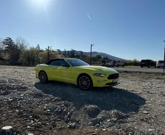 Ford Mustang Cabrio 2022 beschikbaar voor verhuur in Tbilisi, met een kilometerlimiet van 200 km/dag.