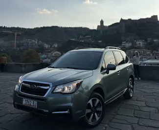 Vooraanzicht van een huurauto Subaru Forester in Tbilisi, Georgië ✓ Auto #11189. ✓ Transmissie Automatisch TM ✓ 0 beoordelingen.