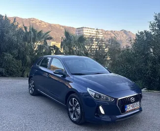Vooraanzicht van een huurauto Hyundai i30 in Becici, Montenegro ✓ Auto #11793. ✓ Transmissie Automatisch TM ✓ 0 beoordelingen.