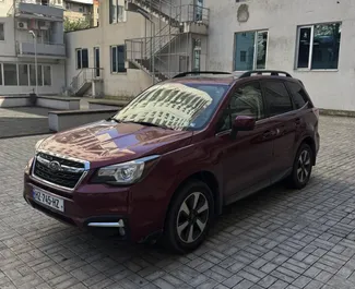 Vooraanzicht van een huurauto Subaru Forester in Tbilisi, Georgië ✓ Auto #12949. ✓ Transmissie Automatisch TM ✓ 0 beoordelingen.