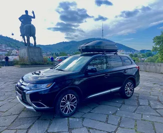 Vooraanzicht van een huurauto Mitsubishi Outlander Xl in Tbilisi, Georgië ✓ Auto #13162. ✓ Transmissie Automatisch TM ✓ 0 beoordelingen.