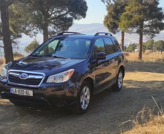 Vooraanzicht van een huurauto Subaru Forester in Tbilisi, Georgië ✓ Auto #6821. ✓ Transmissie Automatisch TM ✓ 1 beoordelingen.