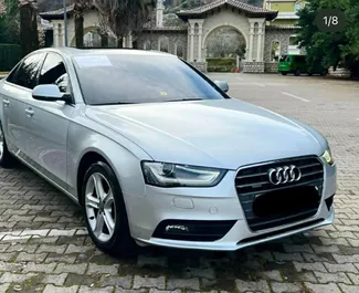 Vooraanzicht van een huurauto Audi A4 op de luchthaven van Tirana, Albanië ✓ Auto #13058. ✓ Transmissie Automatisch TM ✓ 0 beoordelingen.