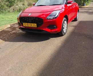 Vooraanzicht van een huurauto Suzuki Swift in Mauritius, Mauritius ✓ Auto #13070. ✓ Transmissie Automatisch TM ✓ 0 beoordelingen.